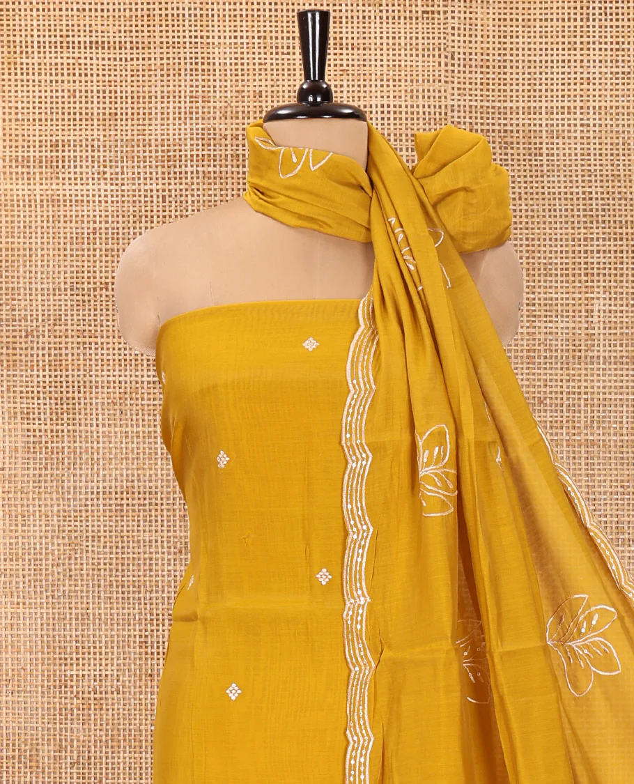Mustard Mul Chanderi Designer Material Chudidar Set, Meticulously Woven with Big Floral Motifs Embroidered On Its Top, A Plain Santoon Bottom, and Paired with a Mul Chanderi Scallop Thread Embroidered Dupatta - Image 3