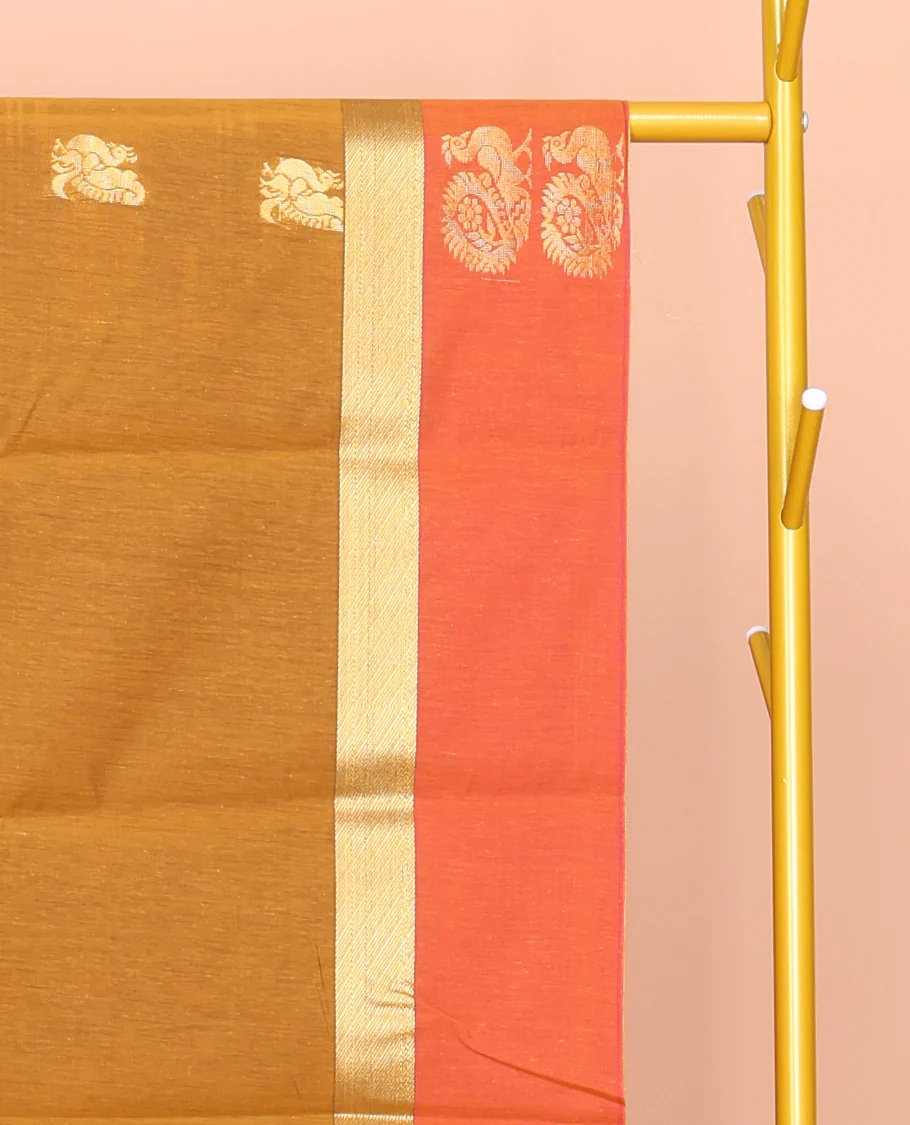 Mustard Semi-Silk Cotton Saree, Ornamented with Peacock Buttas All Over Its Body, Complemented by a Contrast Border of Peacock Designs, Pallu Steeped with Peacock Designs, and Paired with a Contrast Blouse - Image 2