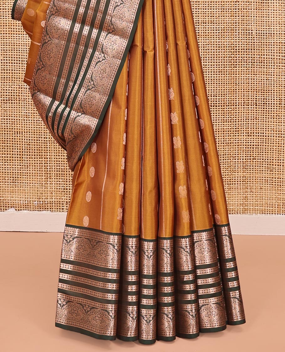 Mustard Vasundhara Lite Silk Mix Saree, Richly Detailed with Zari Buttas and Stripes All Over Its Body Complemented by Contrast Border of Thilakam Mokku, Rudraksham, and Mayil Designs, Grand Jaal Pallu, and Paired with a Contrast Blouse - Image 4