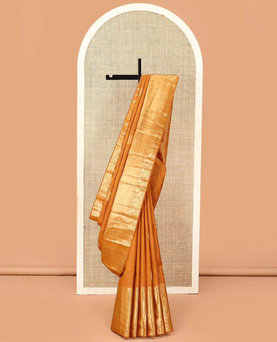 Mustard zari stripes and buttas Kanchipuram silk saree,  zari border of thilakam, paisa, round mayil, and mayil kann designs, and jaal pallu