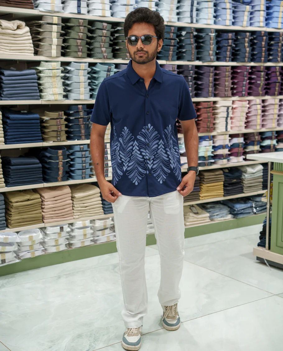 Navy Blue Cotton-Blended Casual Shirt Comes with Tropical Floral Print, Spread Collar, Half Sleeves, Regular Fit, and Regular Length - Image 2