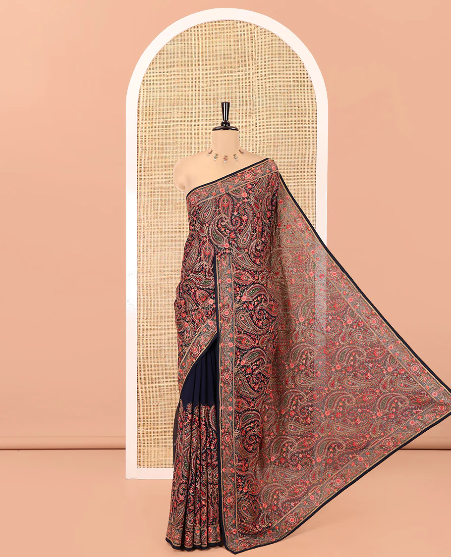 Navy Blue Georgette Saree, Ornamented with Intricate Paisleys, Kashmir Embroidered and Stone Work on Its Body, a Self-Embroidered Border, and Paired with an Embroidered Blouse