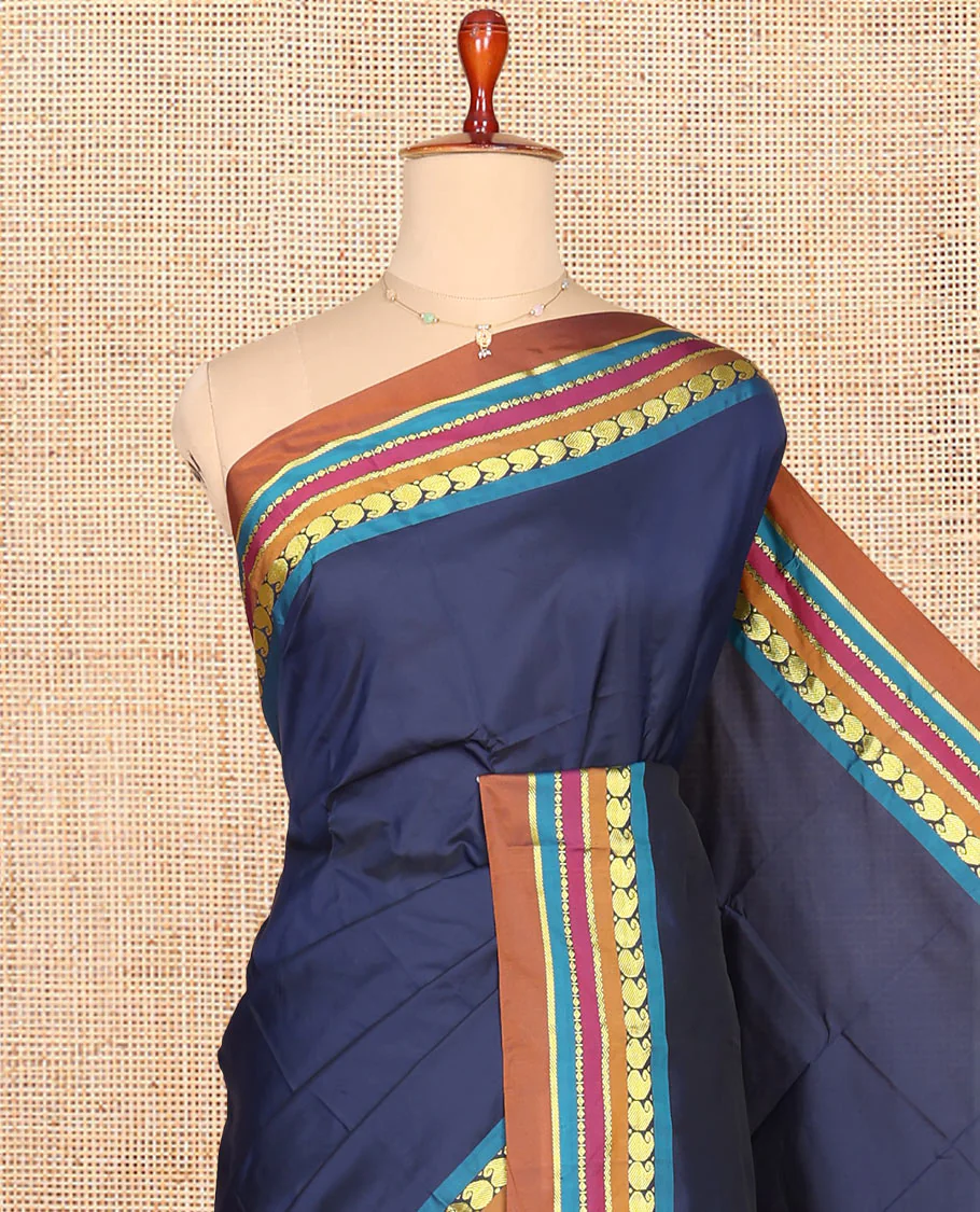 Navy Blue Plain Aarani Gift Saree, Complemented by a Contrast Traditional Design Temple Border, Captivating Contrast Pallu of Stripes, and Paired with a Contrast Blouse - Image 2