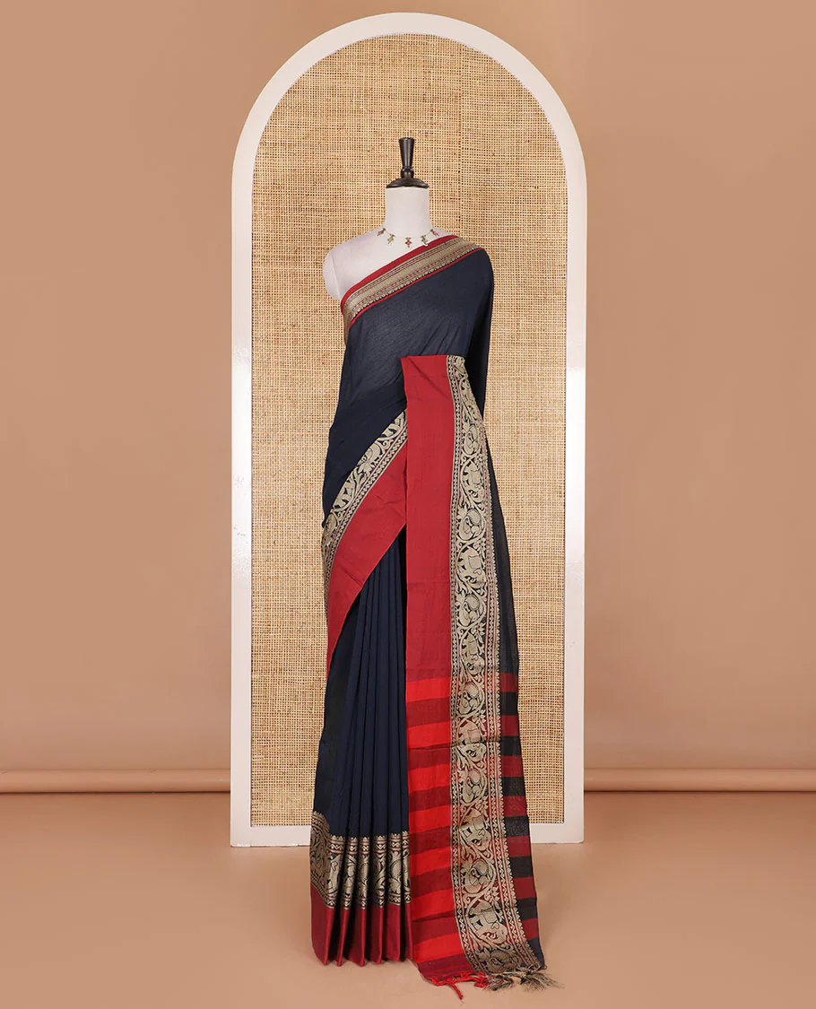 Navy blue plain mercerised cotton saree, contrast traditional border of peacock, and elephant motifs, striped pallu, and a matching blouse - Image 2