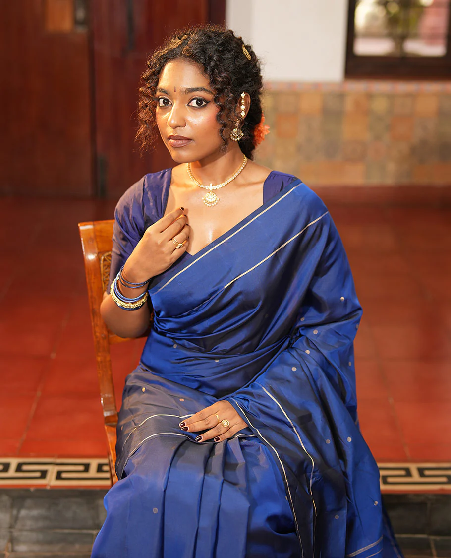Navy Blue Vasundhara Lite Silk Saree, Subtly Sparkled with Paisa Zari Buttas Across Its Body, Highlighted Zari Border of Horizontal Stripes, Gleaming Pallu of Seppu Rekku Designs, and Paired with a Matching Blouse - Image 4