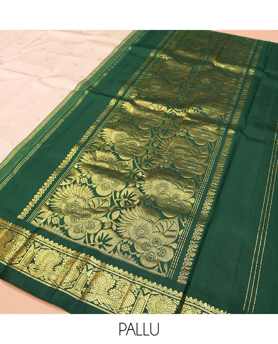 Off-White Kanchipuram Silk Saree, Embellished with Zari Buttas on Its Body, Complemented by a Contrast One-Sided Korvai Border of Salngai, Banaras, and Mayil Designs, Pallu of Floral Zari Designs, and Comes Without a Blouse - Image 5