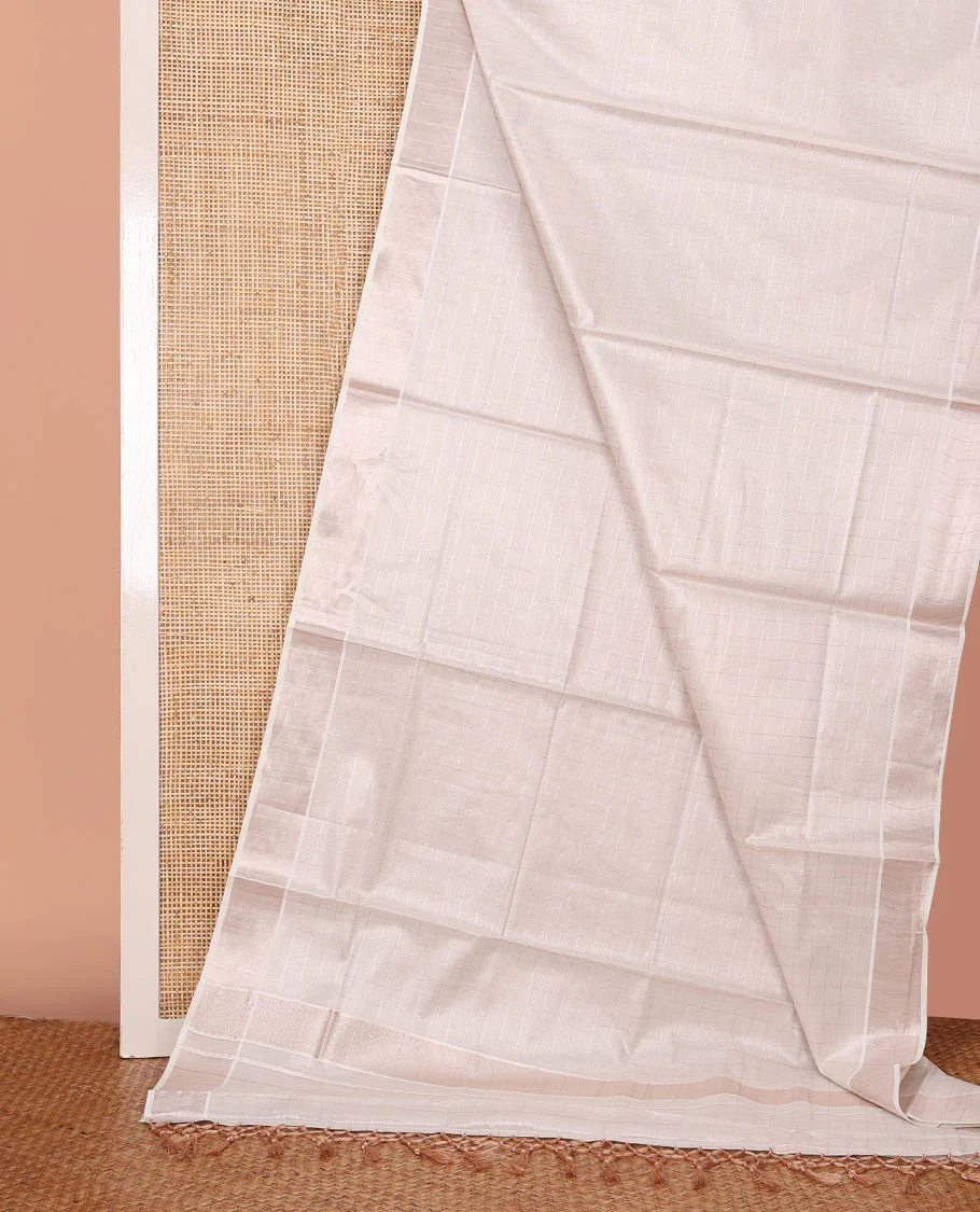 Off-White Kerala Cotton Saree Subtly Sparkled with Zari Checks All Over Its Body, Zari Bavanji Border, Gleaming Zari Striped Pallu, and Paired with a Matching Blouse