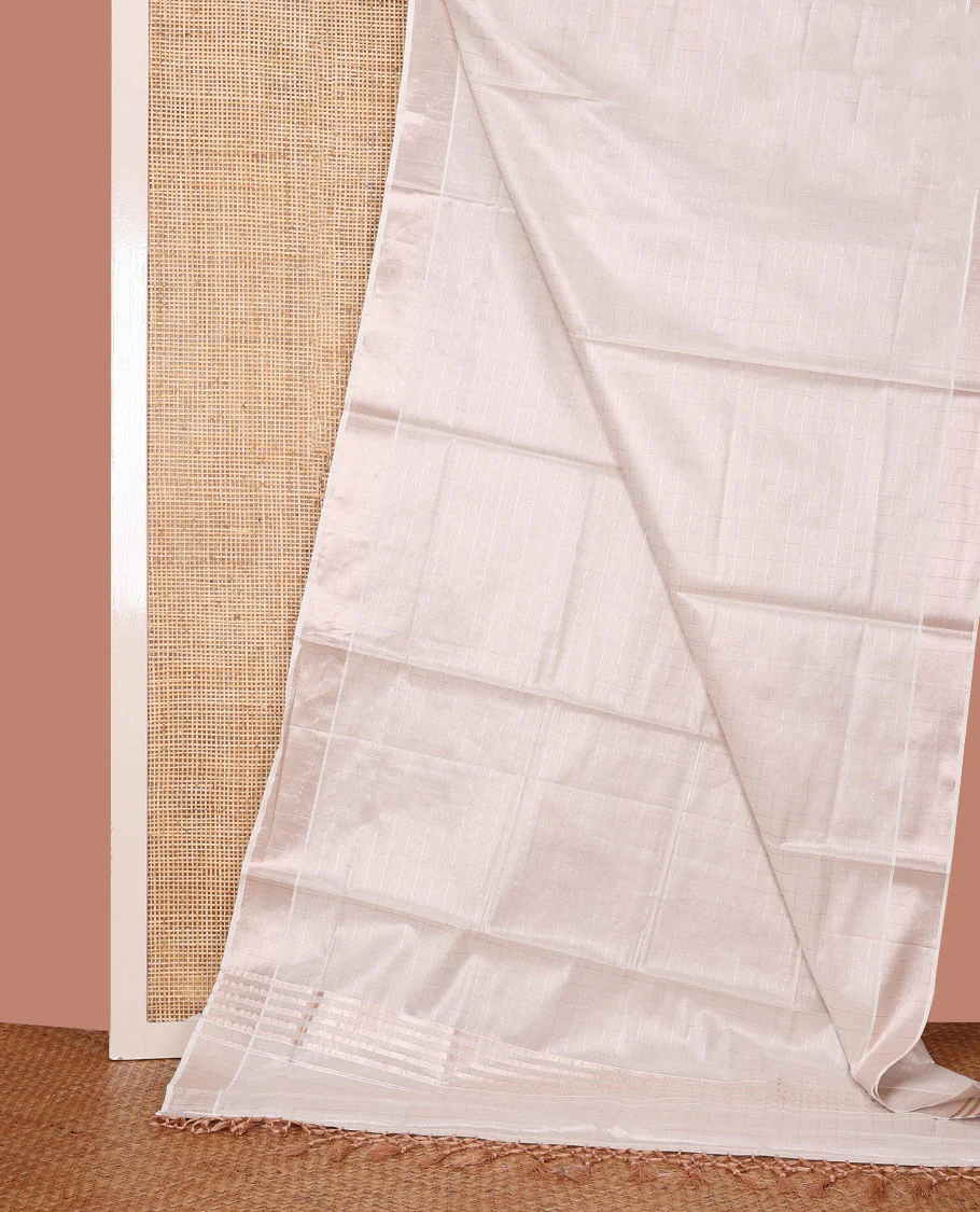 Off-White Kerala Cotton Saree Woven with Zari Checks All Over Its Body, Zari Bavanji Border, Gleaming Zari Striped Pallu, and Paired with a Matching Blouse