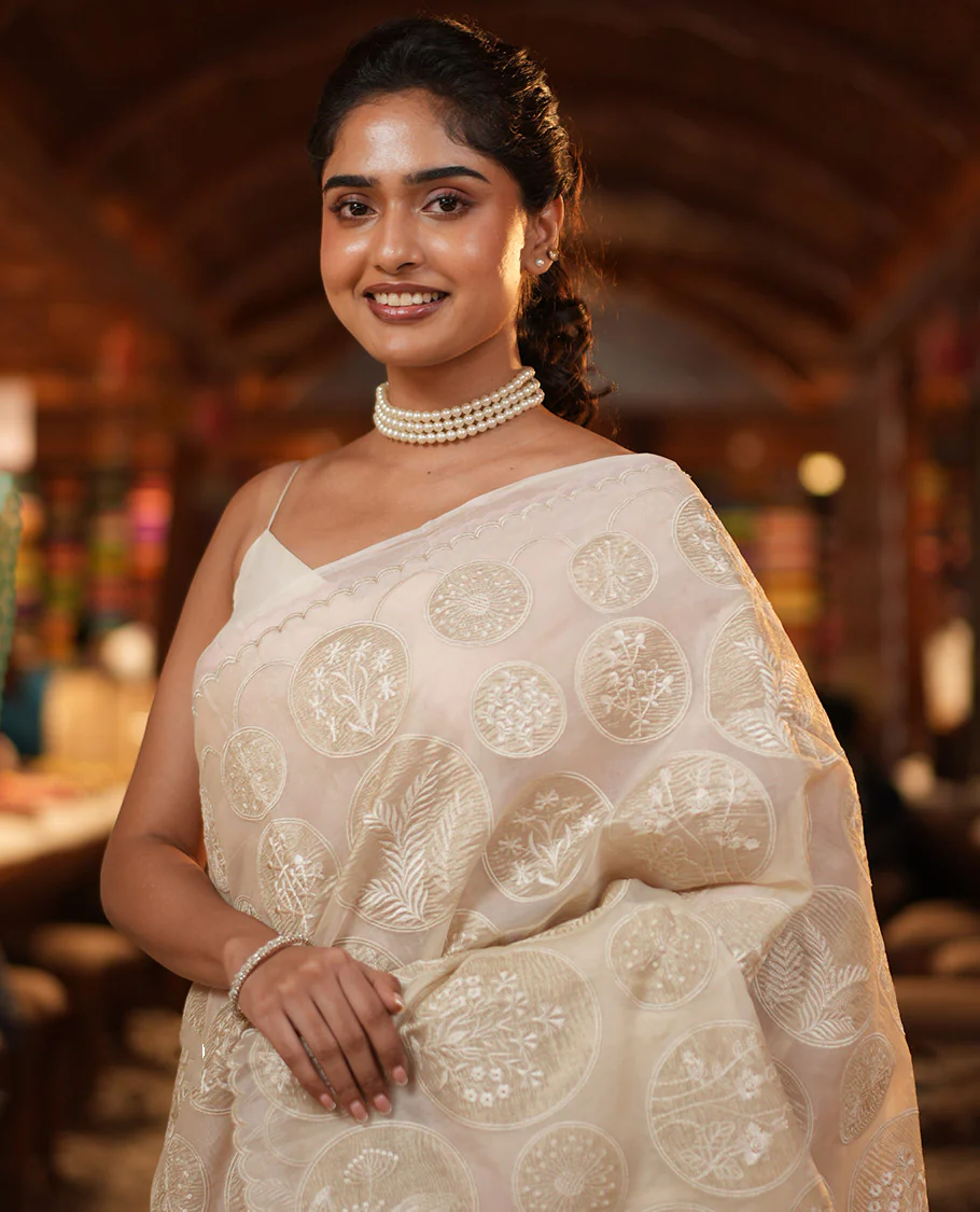 Off-White Organza Saree, Delicately decked Up with Floral Enclosed Circle Motifs Thread Embroidery, Subtle Scallop Border, Delicately Embroidered Pallu, and Paired with a Matching Embroidered Blouse - Image 3