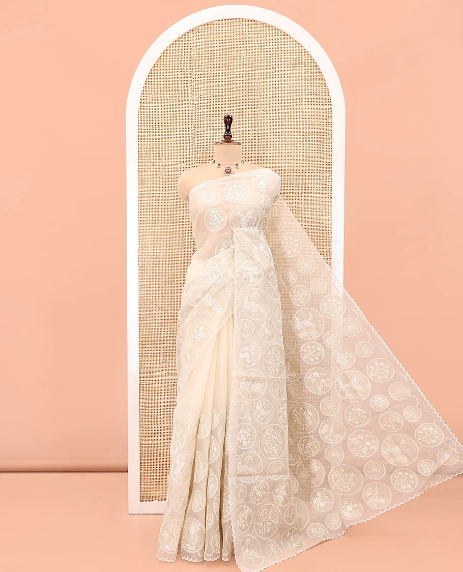 Off-White Organza Saree, Delicately decked Up with Floral Enclosed Circle Motifs Thread Embroidery, Subtle Scallop Border, Delicately Embroidered Pallu, and Paired with a Matching Embroidered Blouse - Image 6