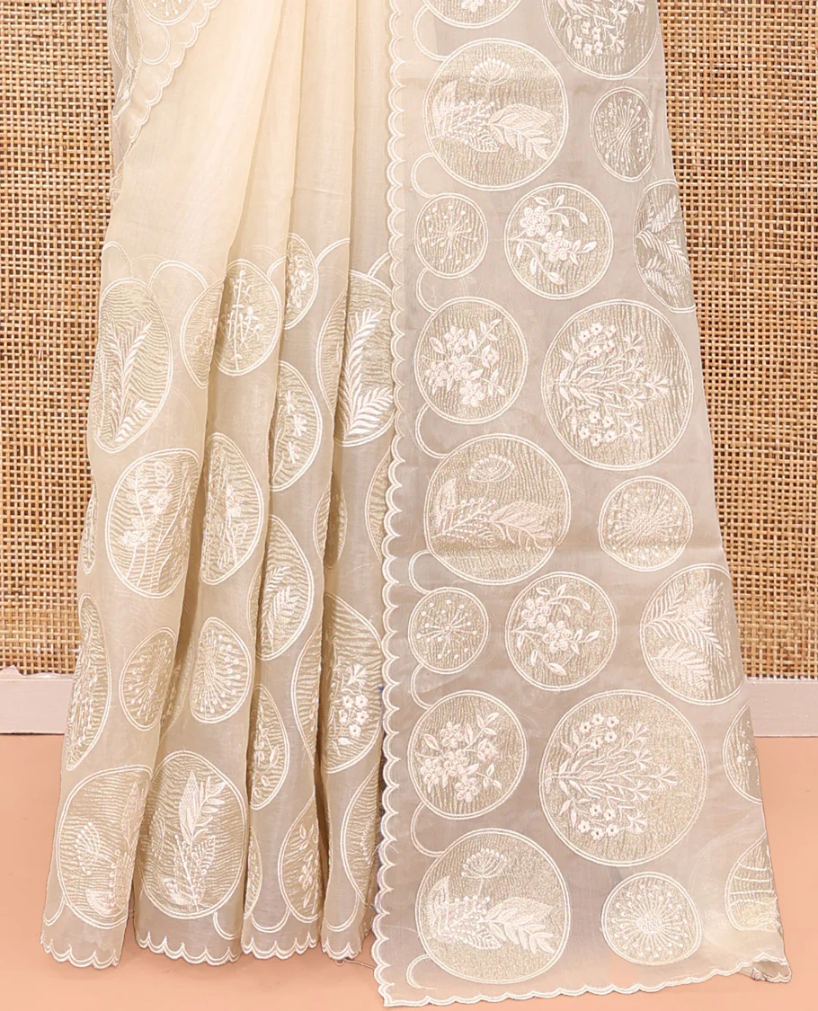 Off-White Organza Saree, Delicately decked Up with Floral Enclosed Circle Motifs Thread Embroidery, Subtle Scallop Border, Delicately Embroidered Pallu, and Paired with a Matching Embroidered Blouse - Image 9