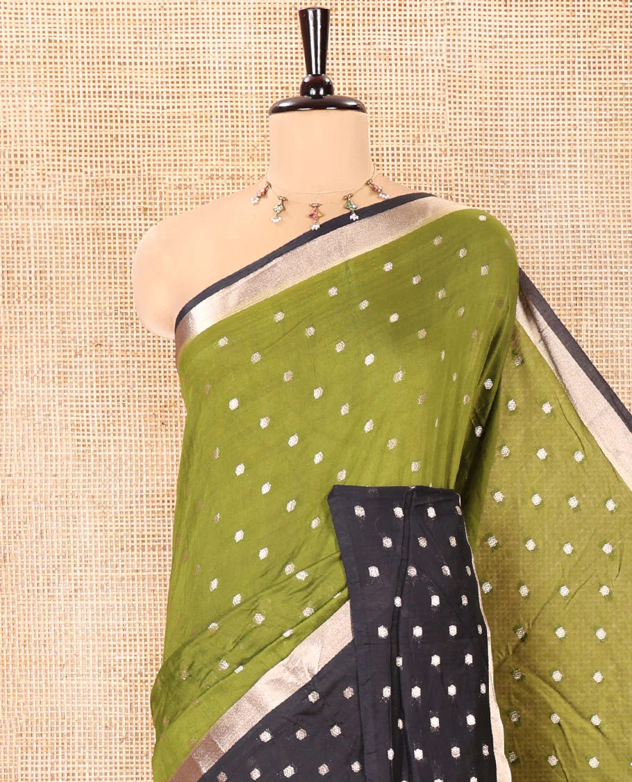 Olive Green Assam Silk Saree, Charmingly Accented with Zari Buttas on Its Body, Complemented by Contrast Border Steeped with Zari Buttas, Pallu Steeped with Gleaming Zari Stripes and Buttas, and Paired with a Contrast Blouse - Image 2