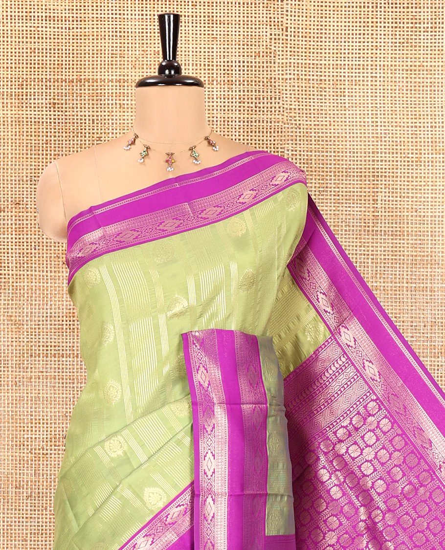Olive Green Litchi Saree, Woven with Vaira Oosi Stripes and Zari Buttas on Its Body, Complemented by a Contrast Rettai Pettu Traditional Zari Design Border, an Intricately Designed Pallu, and Paired with a Contrast Blouse - Image 2
