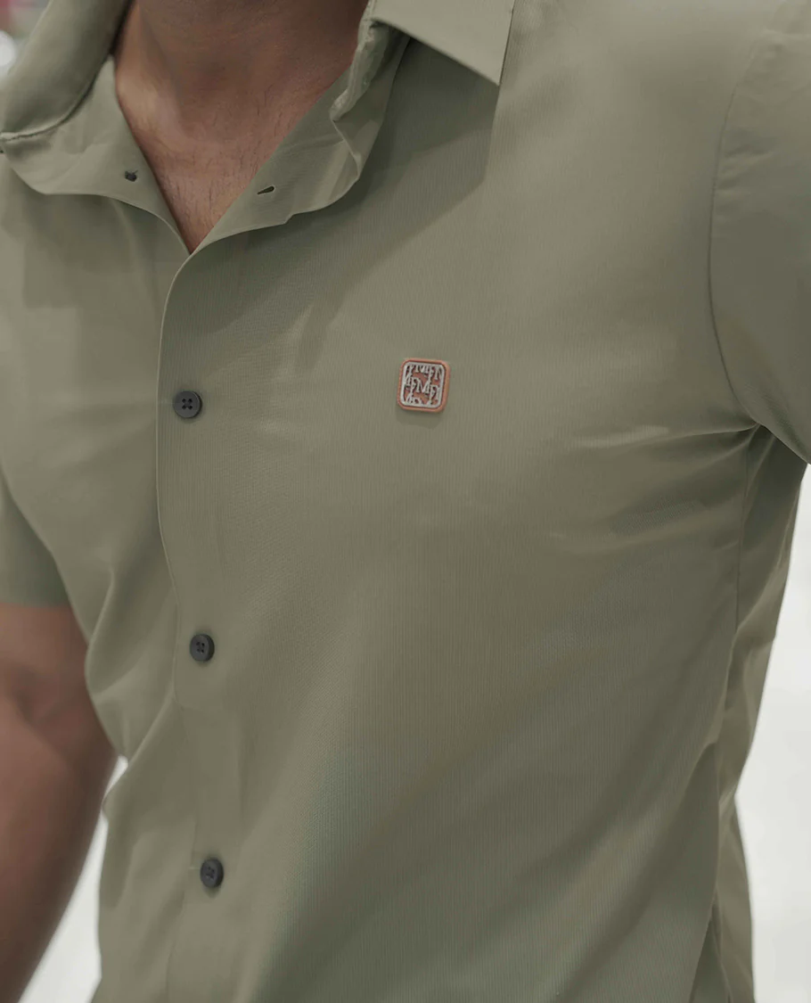 Olive Green Plain Poly Lycra Blended Casual Shirt, Comes with a Spread Collar, Stitchless Half-Sleeves, Slim Fit, and Regular Length - Image 5