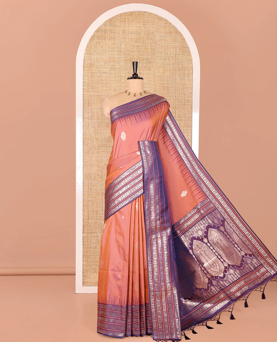 Onion Pink Elite Soft Silk Saree, Adorned with Zari Buttas All Over Its Body, Complemented by Contrast Temple Traditional Zari Border of Peacock-Rudraksham Motifs, Intricately Zari Woven Pallu and Paired with a Contrast Blouse