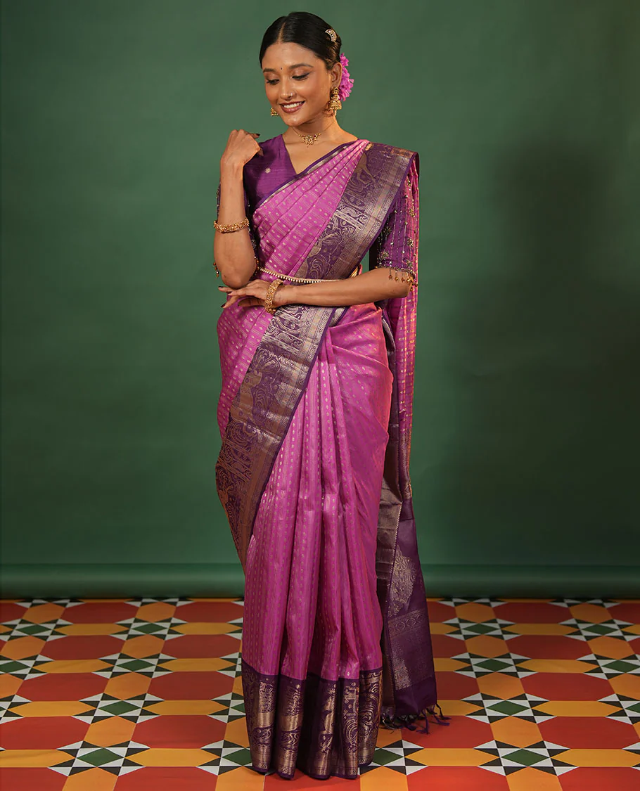 Onion pink varai oosai and rudraksham buttas Vasundhara silk saree, contrast kuthirai motifs zari woven border, and intricate pallu