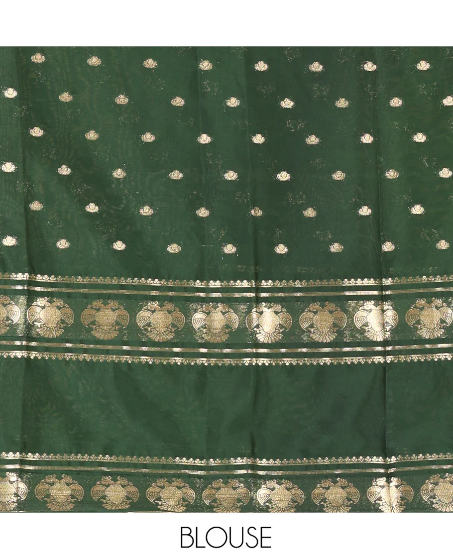 Orange Art Mysore Silk Saree, Decked Up with Zari Buttas All Over Its Body, Complemented by a Contrast Rettai Pettu Border of Two-Headed Eagle Designs, Pallu Steeped with Buttas and Stripes, and Paired with a Contrast Blouse - Image 3