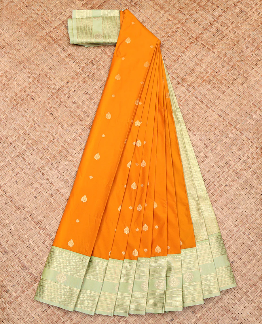 Orange Budget Silk Saree, Featuring Zari Buttas All Over Its Body, Complemented by a Contrast Traditional Zari Design Border, a Pallu Steeped with Traditional Design, and Paired with a Contrast Blouse - Image 2