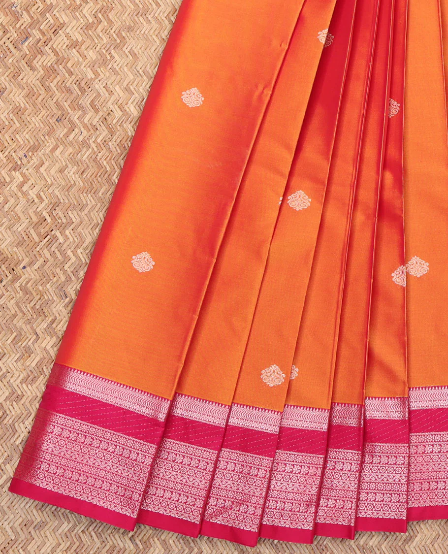 Orange Budget Silk Saree, Subtly Detailed with Zari Buttas All Over Its Body, Complemented by a Contrast Traditional Zari Design Border, Geometric-Patterned Pallu, and Paired with a Contrast Blouse