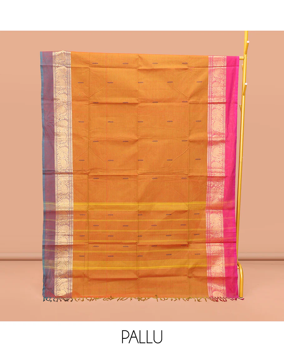 Orange Chettinad Cotton Saree, Finely Crafted with Buttas All Over Its Body, Complemented by a Contrast Ganga-Jamuna Kal Eragina Border of Kodi Peacock and Elephant Designs, Pallu of Buttas and Stripes, and Paired with a Matching Blouse - Image 3