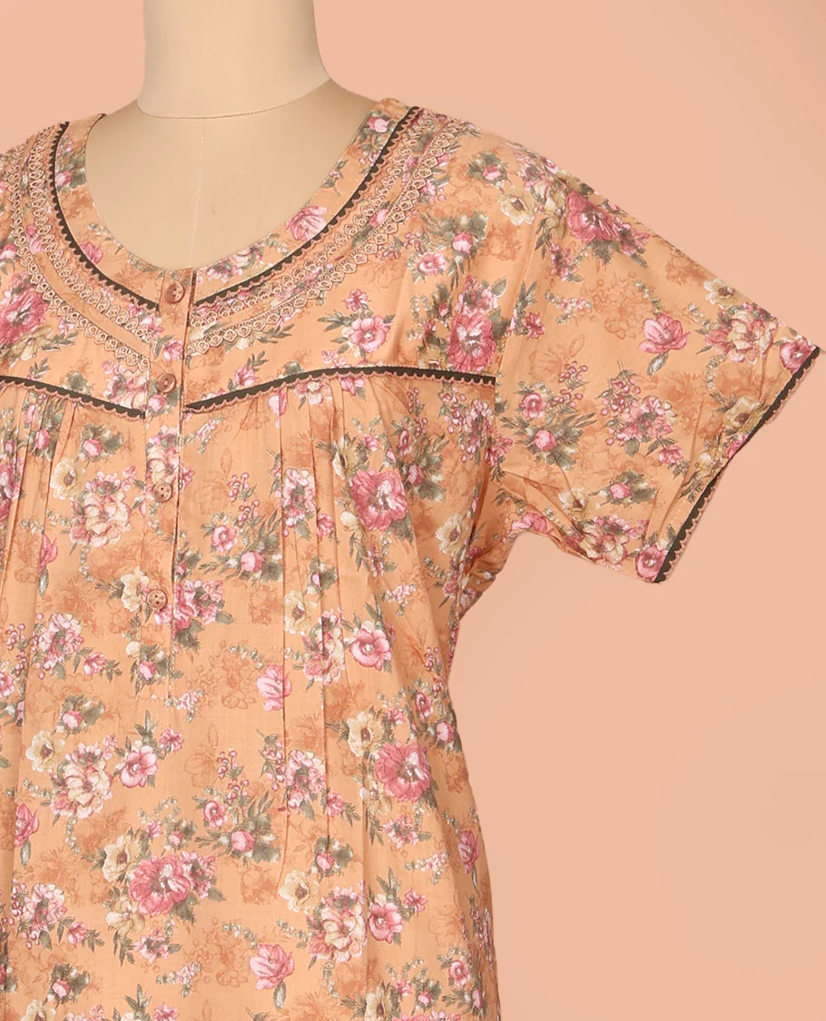 Orange Cotton Nighty Decked Up with Floral Print, Featuring Lace Work, Round Front Neck, and Half Sleeves