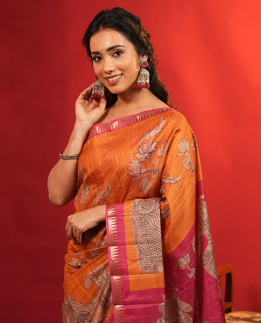 Orange Semi-Tussar Silk Saree, Artfully Detailed with Kalamkari-Style Human Motifs Printed on Its Body, Complemented by a Contrast Temple Zari Border, Creatively Kalamkari Printed Pallu, and Paired with a Contrast Blouse - Image 3