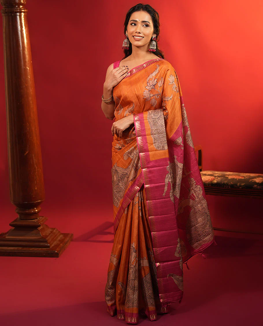Orange Semi-Tussar Silk Saree, Artfully Detailed with Kalamkari-Style Human Motifs Printed on Its Body, Complemented by a Contrast Temple Zari Border, Creatively Kalamkari Printed Pallu, and Paired with a Contrast Blouse - Image 4