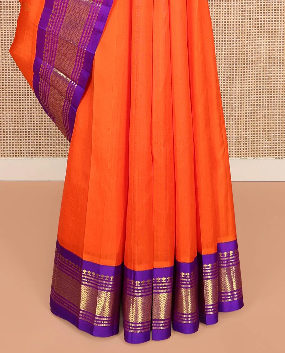 Orange Kanchipuram Silk Saree, Decked Up with Zari Buttas on Its Body, Complemented by a Contrast One-Sided Korvai Border of Panner Sombu, Banaras, Muthu, and Mayil Kann Designs, Pallu Features Zari Designs, and Comes Without a Blouse - Image 4