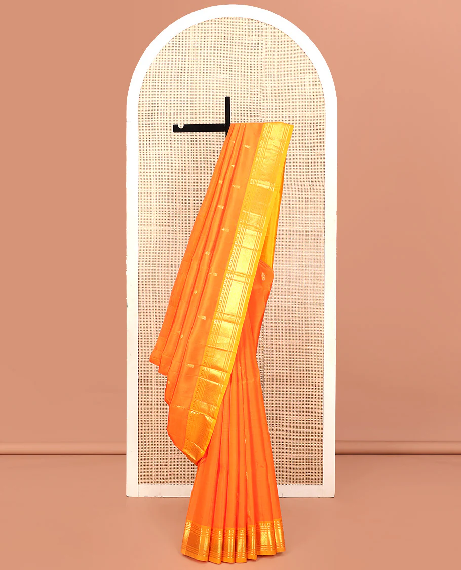 Orange Kanchipuram Silk Saree, Embellished with Zari Buttas, Contrast One-Sided Border of Paneer Sombu, Banaras, Muthu, and Mayil Kann Design, Zari Design Pallu, and No Blouse