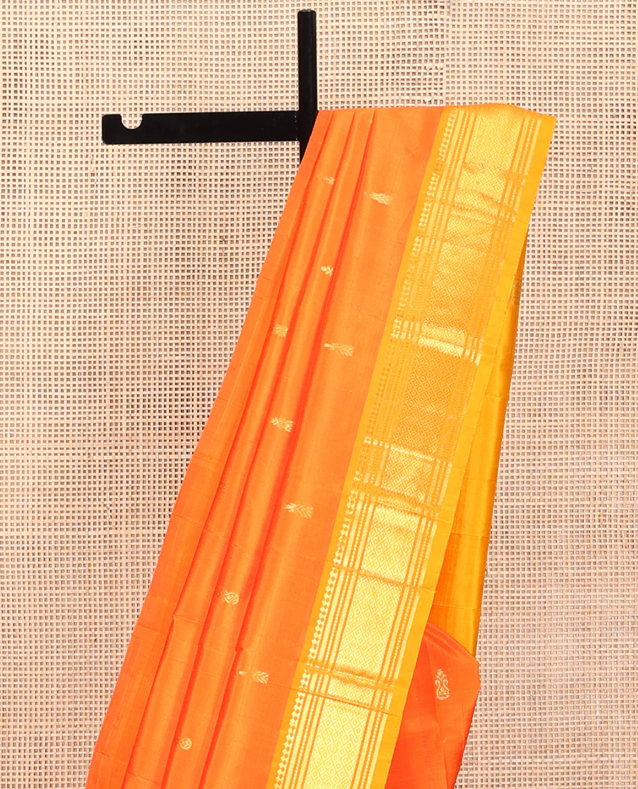 Orange Kanchipuram Silk Saree, Embellished with Zari Buttas, Contrast One-Sided Border of Paneer Sombu, Banaras, Muthu, and Mayil Kann Design, Zari Design Pallu, and No Blouse - Image 3