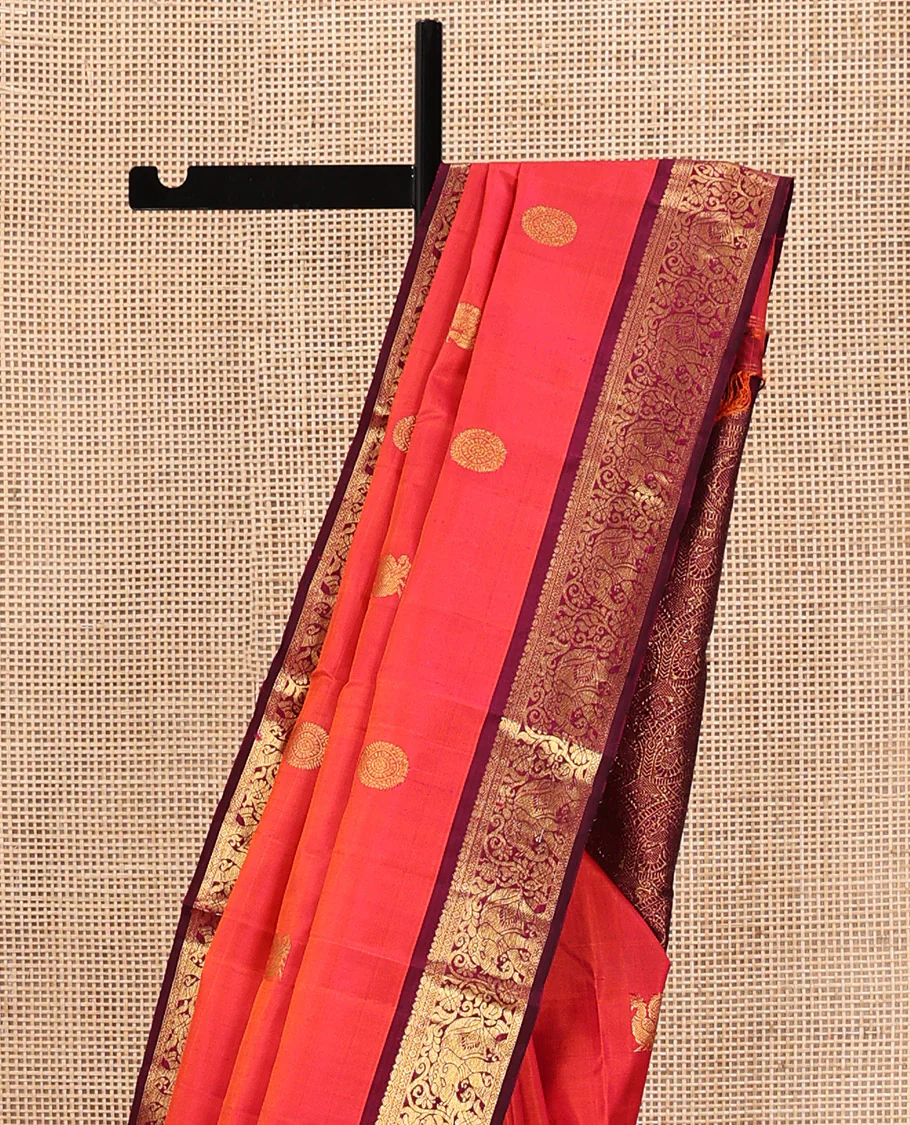 Orange Kanchipuram Silk Saree, Mesmerized with Mayil and Chakram Buttas All Over Its Body, Complemented by Contrast Border of Thilakam, Cross Kamalam, and Yaanai Designs, Pallu Steeped with Rettai Mayil Designs, and Paired with a Contrast Blouse - Image 3