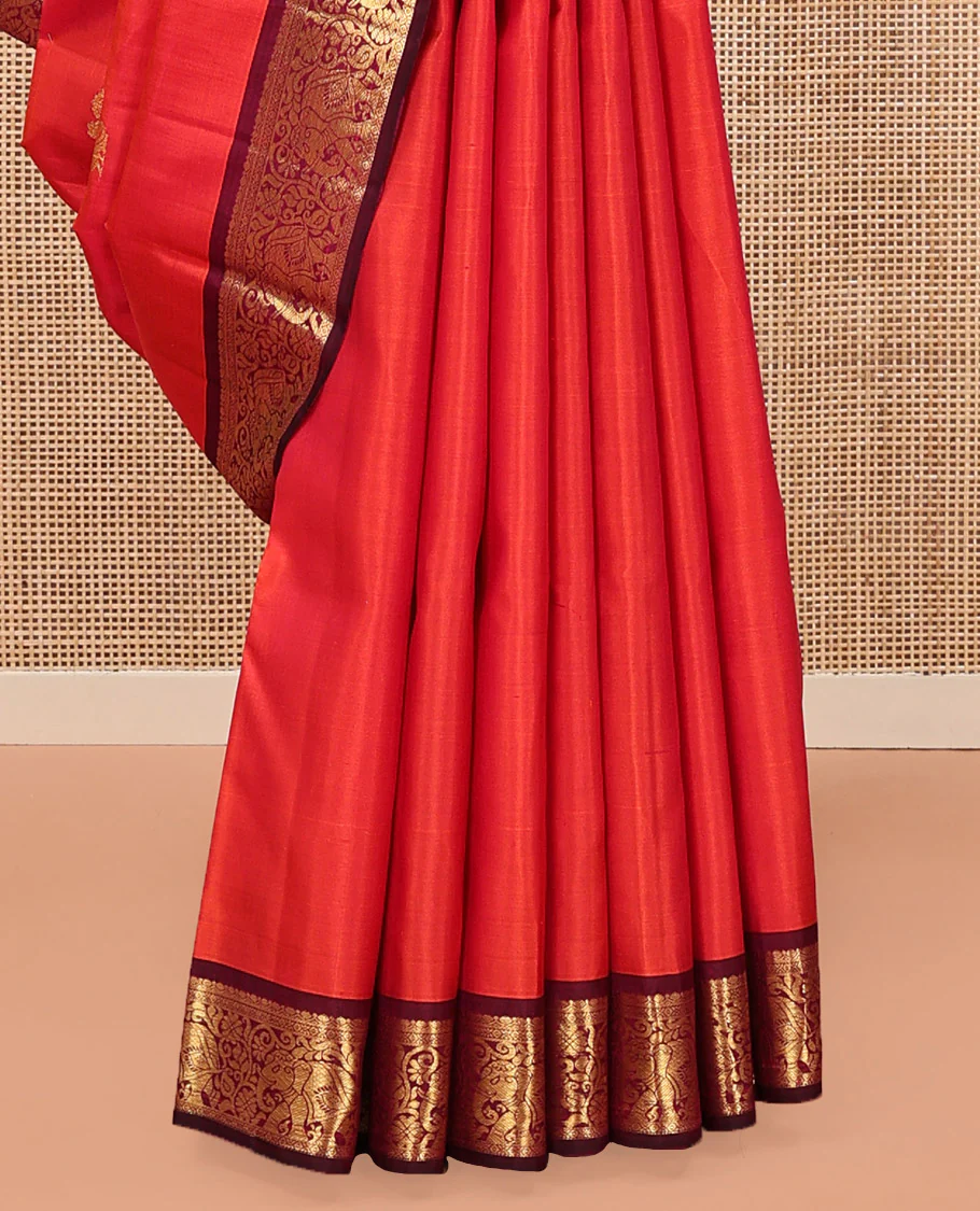 Orange Kanchipuram Silk Saree, Mesmerized with Mayil and Chakram Buttas All Over Its Body, Complemented by Contrast Border of Thilakam, Cross Kamalam, and Yaanai Designs, Pallu Steeped with Rettai Mayil Designs, and Paired with a Contrast Blouse - Image 4