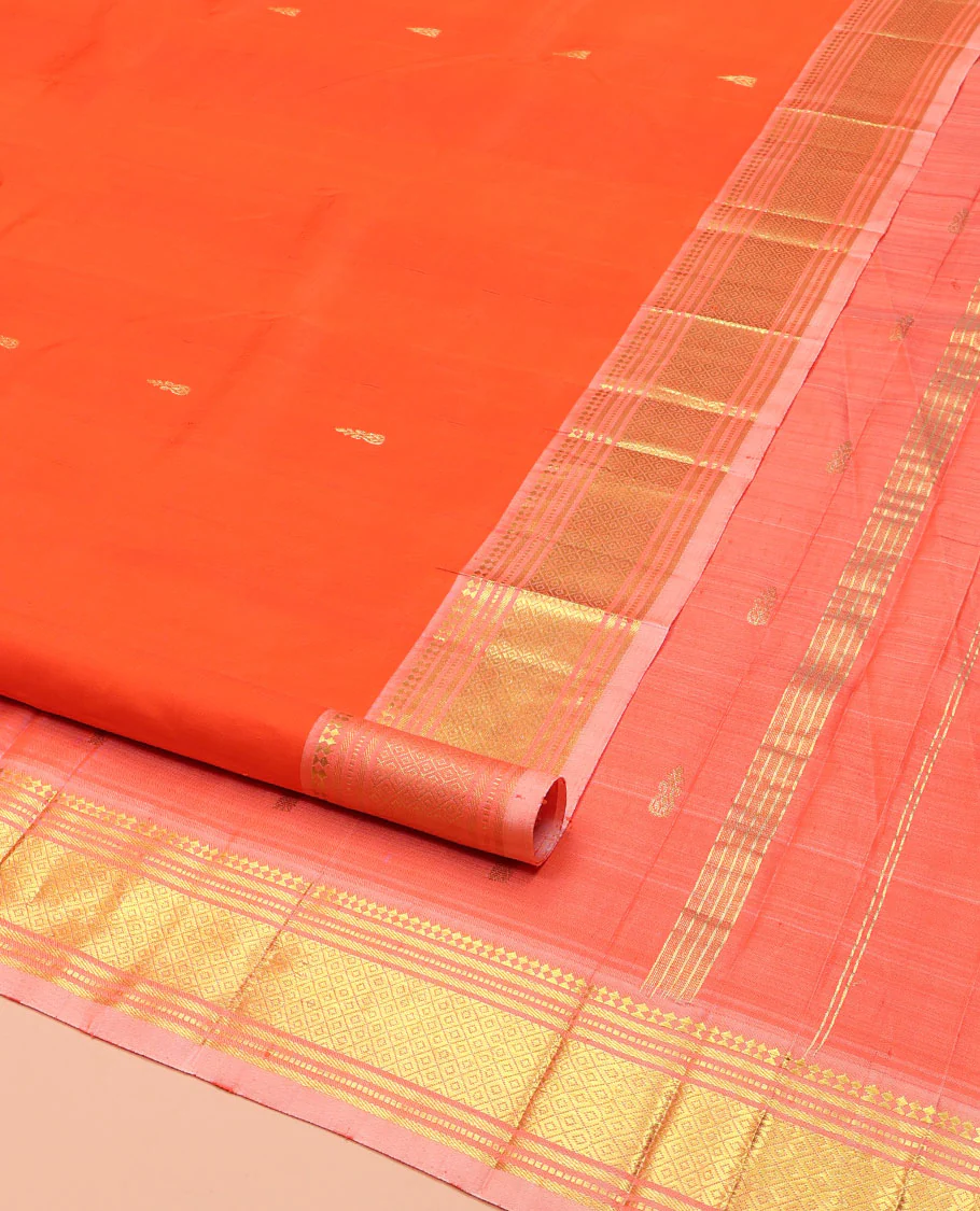Orange Kanchipuram Silk Saree, Mesmerized with Zari Buttas on Its Body, Complemented by a Contrast One-Sided Border of Paneer Sombu, Banaras, Muthu and Mayil Kann Designs, Pallu of Zari Designs, and Comes Without a Blouse - Image 2