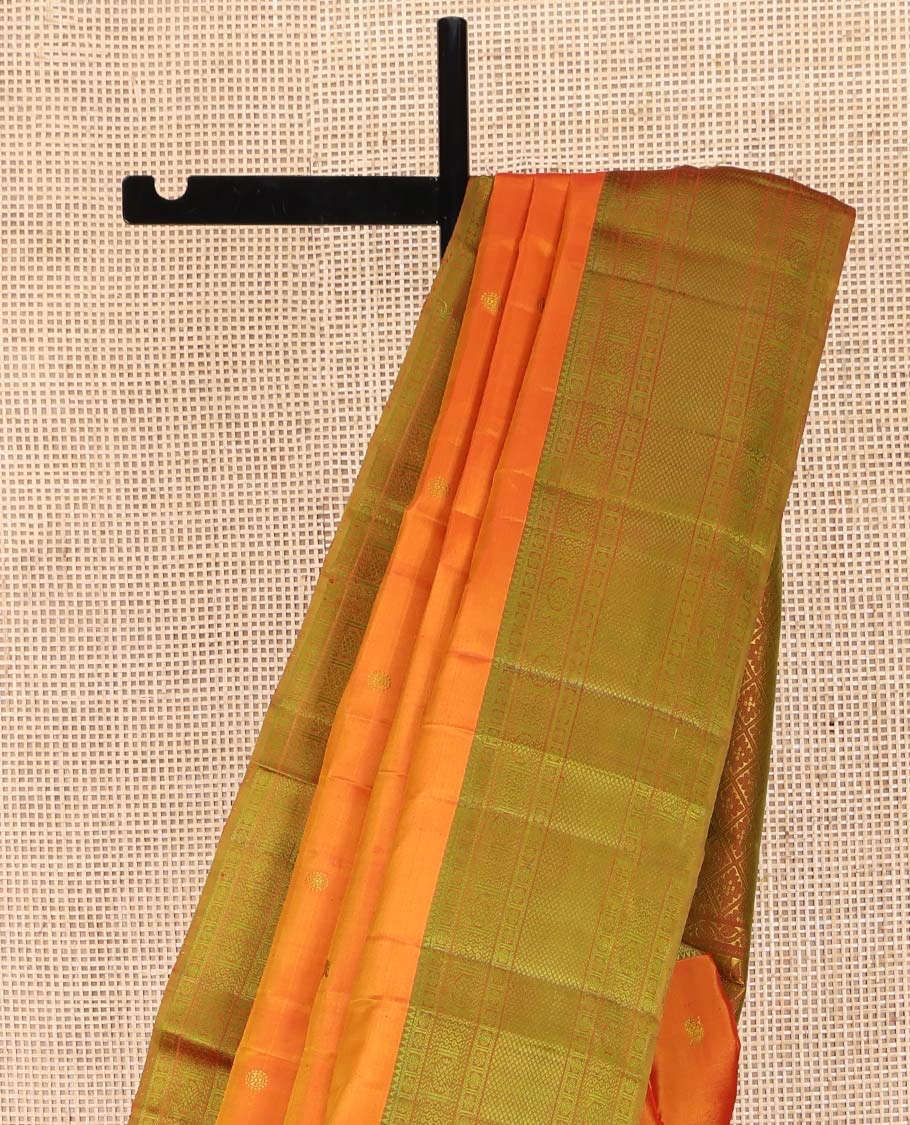 Orange Kanchipuram Silk Saree, Subtly Sparkled with Mayil-Chakram Buttas All Over Its Body, Complemented by a Contrast Border of Rekku, Kamalam, Poun, Chakram, Kuyil Kann, and Then Kuli Kann Designs, Jaal Design Pallu, and Paired with a Contrast Blouse - Image 3