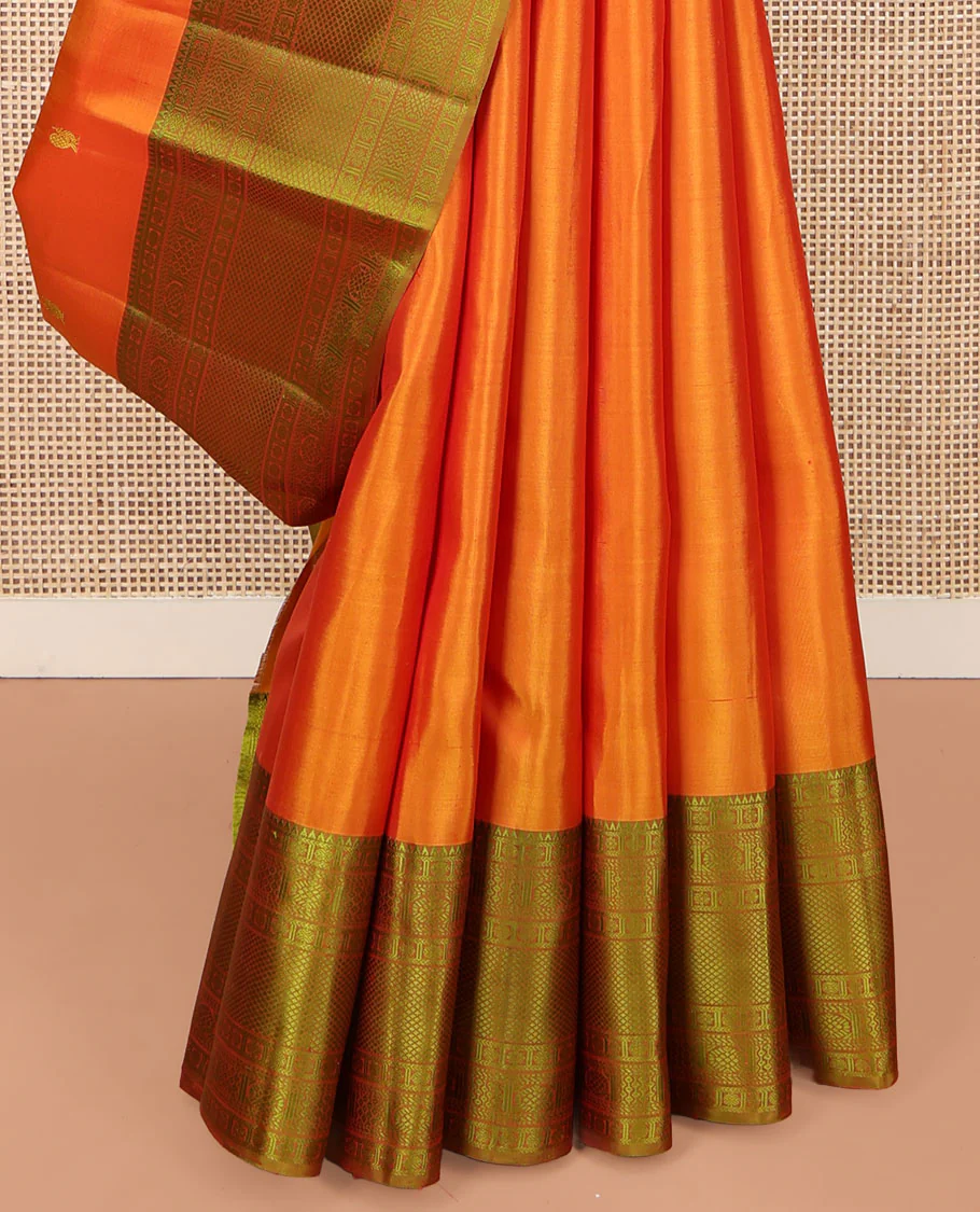 Orange Kanchipuram Silk Saree, Subtly Sparkled with Mayil-Chakram Buttas All Over Its Body, Complemented by a Contrast Border of Rekku, Kamalam, Poun, Chakram, Kuyil Kann, and Then Kuli Kann Designs, Jaal Design Pallu, and Paired with a Contrast Blouse - Image 4