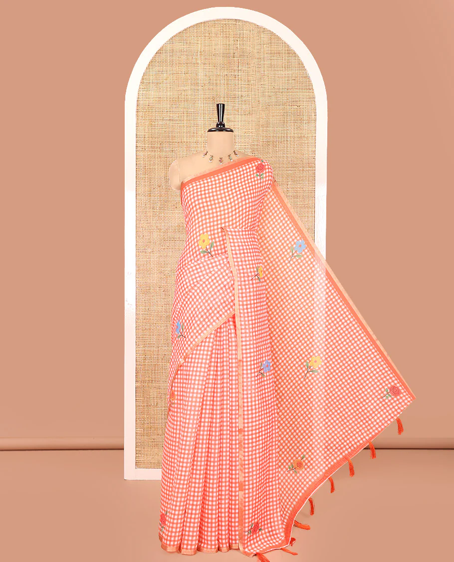 Orange Linen Cotton Saree, Decked up with Micro-Checks and Floral Motifs on Its Body, Subtle Piping Border, a Self-Pallu, and Paired with a Rose Floral Printed Blouse