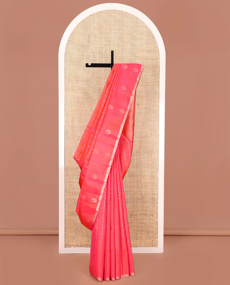 Orange Mayuri Soft Silk Saree, Mesmerized with Neli, and Muthu Designs All Over Its Body, Highlighted by Zari Border of Peacock Designs, Boldly Accentuated Jaal Pallu, and Paired with a Matching Blouse
