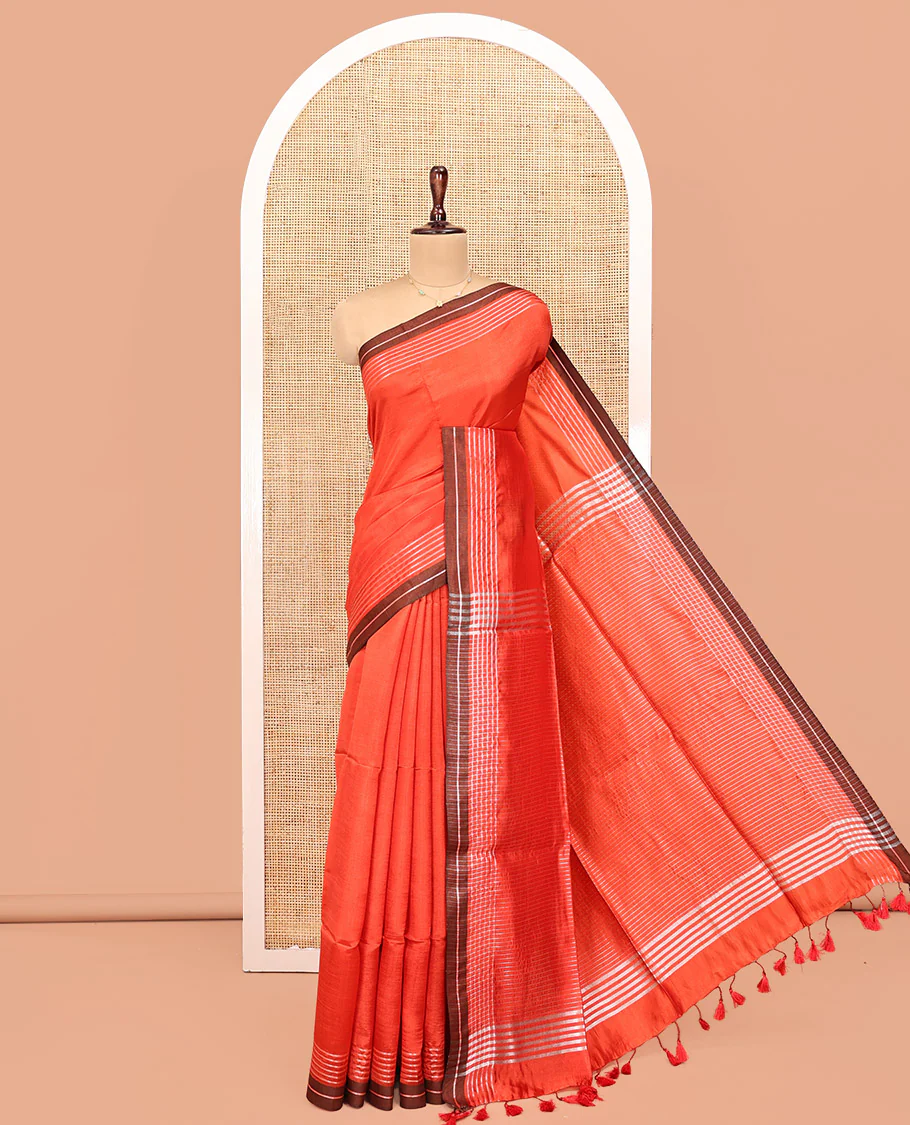Orange Plain Banana Pith Saree, Contrast Subtly Striped Border, Pallu Steeped with Stripes, and Paired with a Matching Blouse