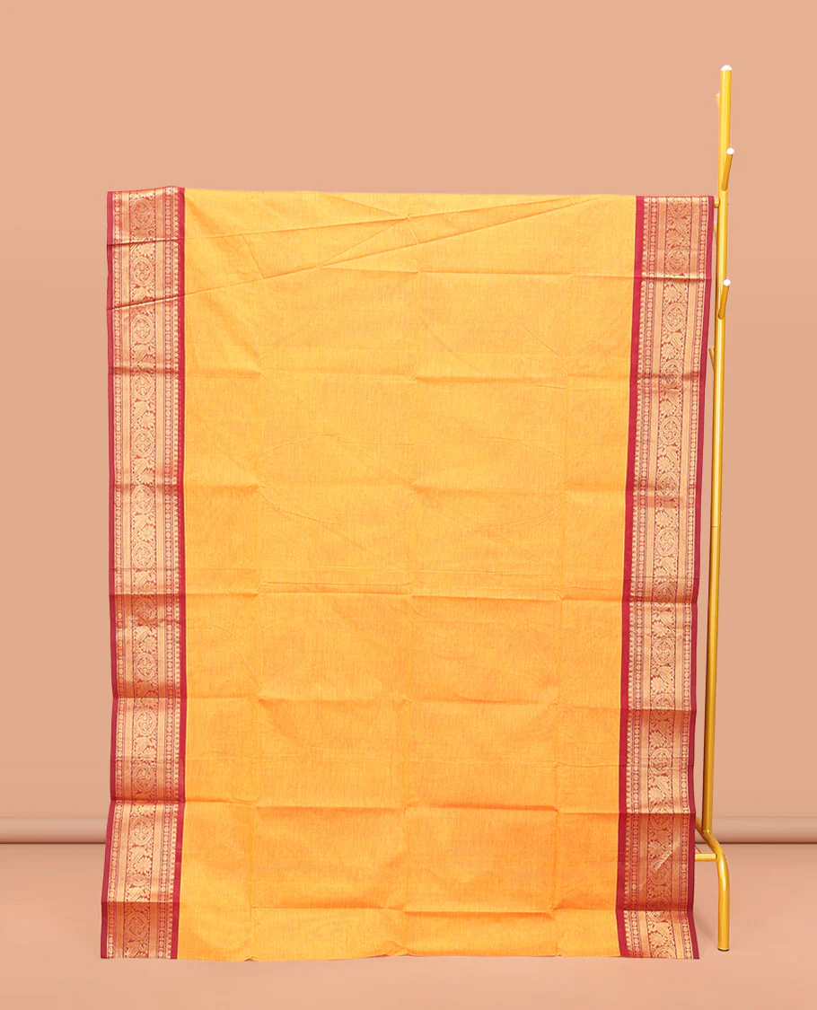 Orange Plain Chettinad Cotton Saree, Complemented by a Contrast Traditional Zari Design Woven Border, Subtle Pallu of Stripes, and Paired with a Matching Blouse