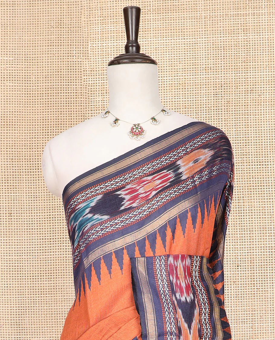 Orange Plain Dupion Silk Saree, Adorned with a Contrast Temple Border of Geometric Patterns and Ikkat Weave, Pallu Depicting Floral Ikkat Designs, and Paired with a Contrast Blouse - Image 2