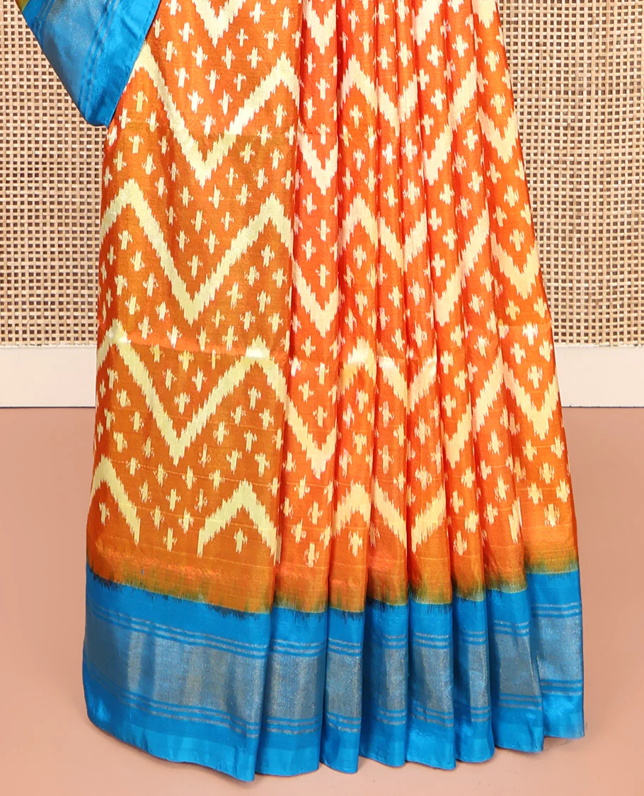 Orange Pochampally Ikat Silk Saree, Ornamented with Buttas and Chevron Design on Its Body, Complemented by a Contrast Border, Pallu of Jaal Designs in Ikkat Weave, and Paired with a Contrast Blouse - Image 4