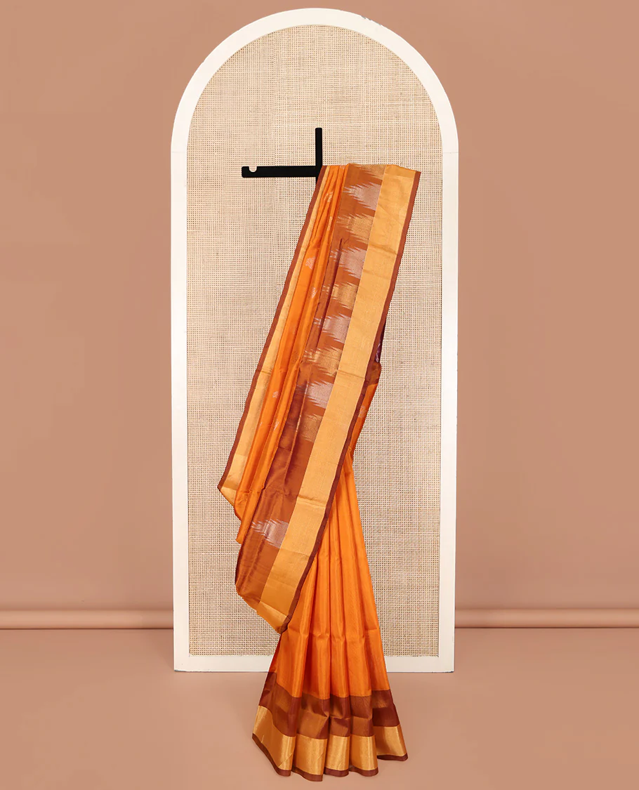 Orange Uppada Silk Saree, Sparsely Woven with Buttas All Over Its Body, Complemented by a Contrast Temple Border, Pallu Pictures Leaf Designs, and Paired with a Contrast Blouse