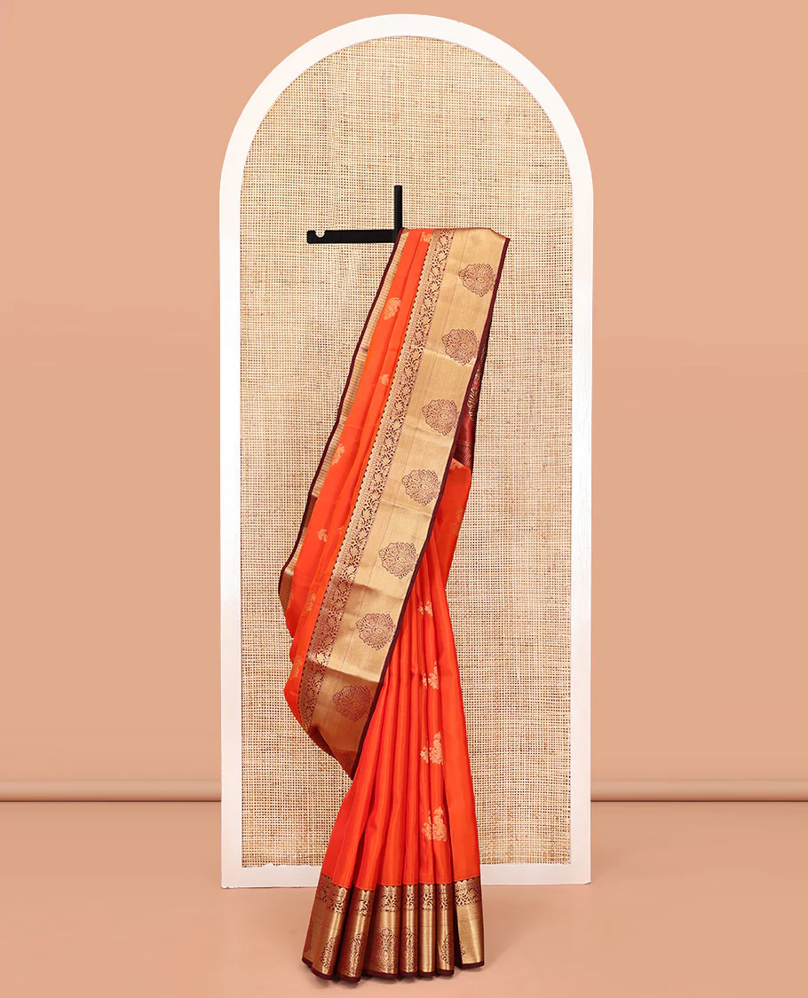 Orange Vasundhara Lite Silk Mix Saree, Accentuated With Zari Buttas All Over Its Body, Complemented by Captivating Contrast Border of Traditional Zari Designs, Grand Pallu of Jaal Designs and Paired with a Contrast Blouse