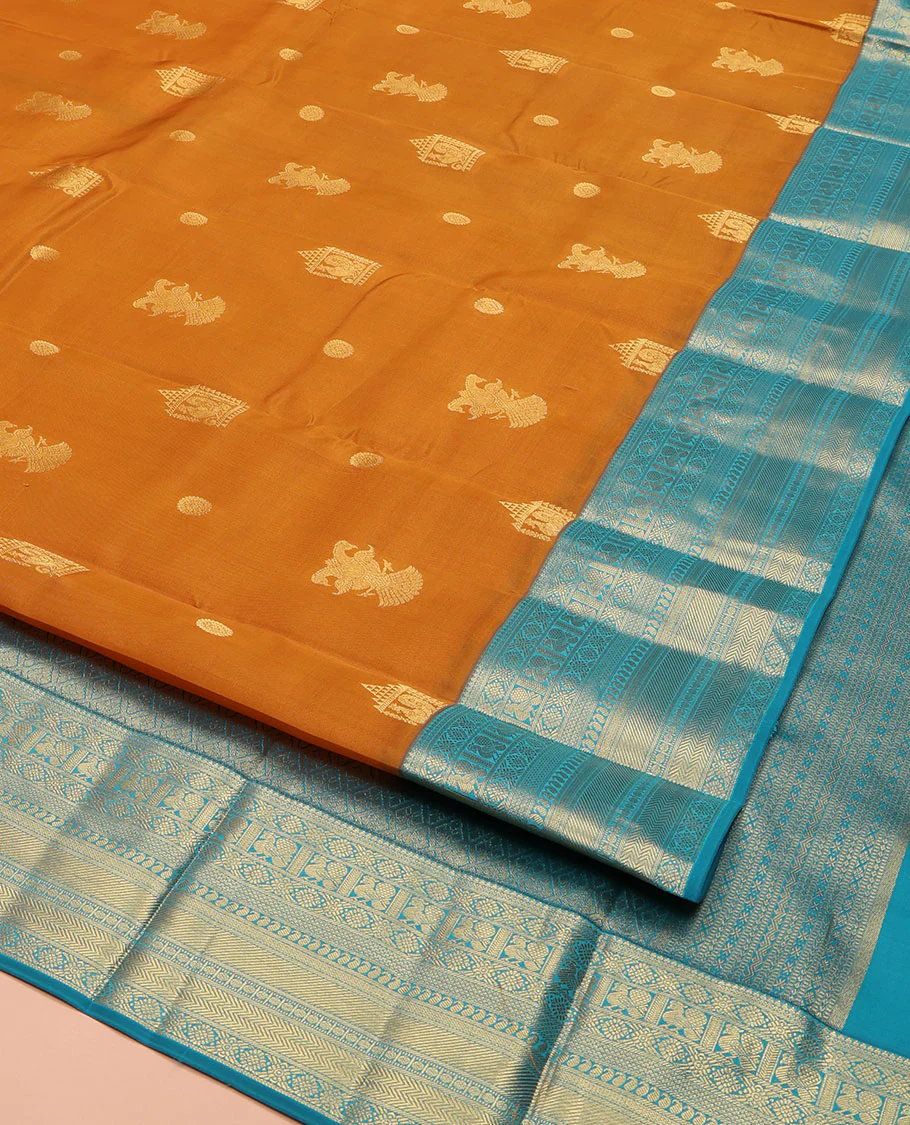 Orange Vasundhara Lite Silk Mix Saree, Detailed with Mayil, Chakra, and Iruthalai Pakshi Buttas, Complemented by Contrast Border of Thilakam Mokku, Mayil, Manga, Vanki, and Mayil Kann Designs, Opulently Embellished Jaal Pallu, and a Contrast Blouse - Image 2