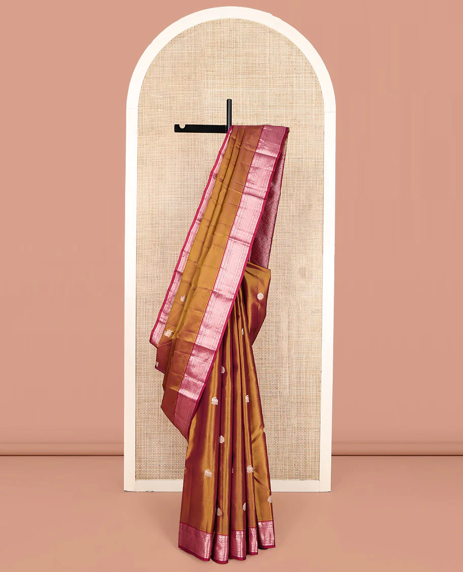 Orange Vasundhara Lite Silk Mix Saree, Elevated with Zari Buttas All Over Its Body, Complemented by a Contrast Border of Rekku, Banaras, Muthu, Kodi Visiry, and Puli Nagam Designs, Grand Jaal Pallu, and Paired with a Contrast Blouse