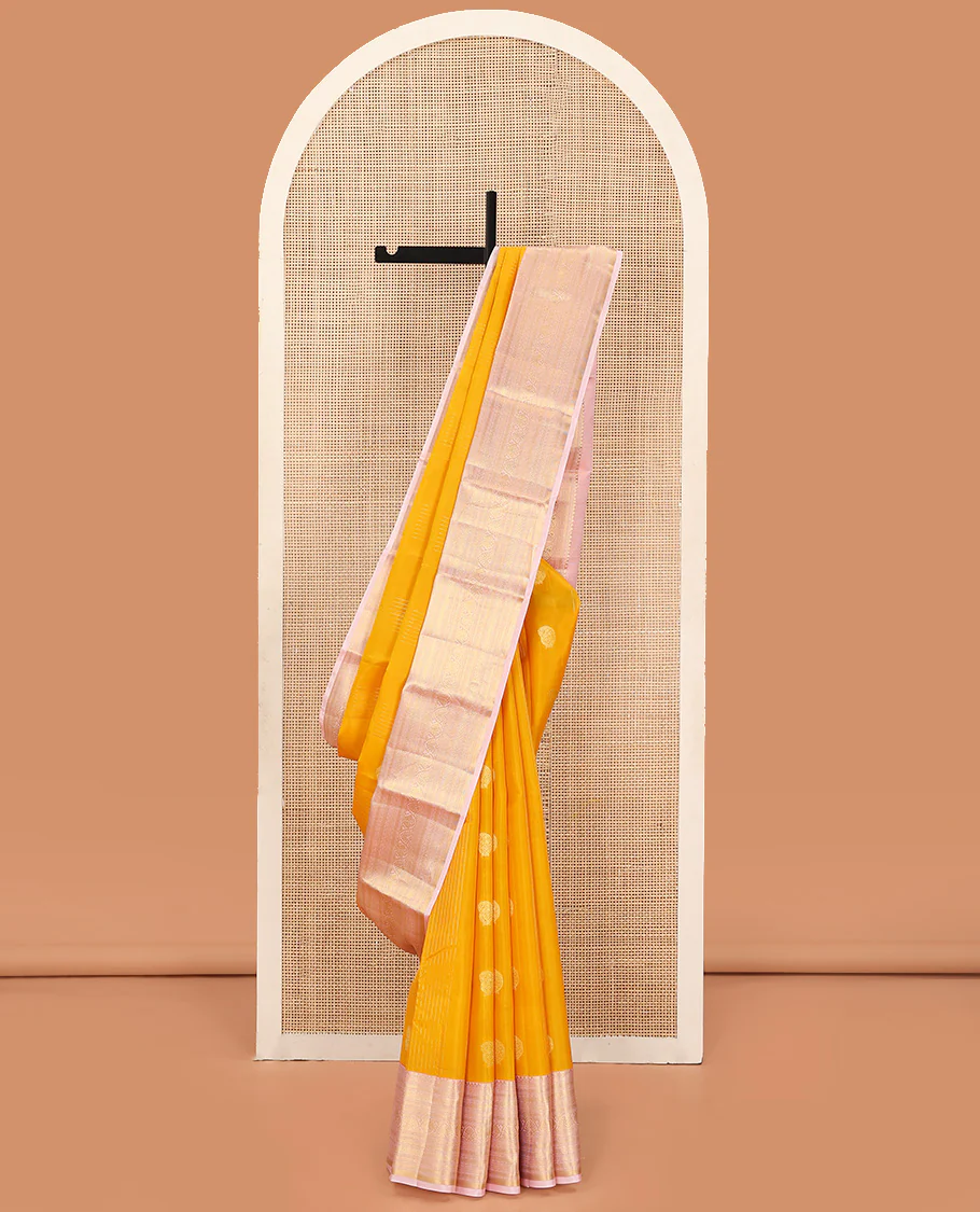 Orange Vasundhara Lite Silk Mix Saree Enhanced with Round Mayil Buttas, Featuring a Contrast Maroon Border of Neli, Kathir, Manga, and Mayil Kann, Pallu Elevated with Zari Designs, and a Contrast Border