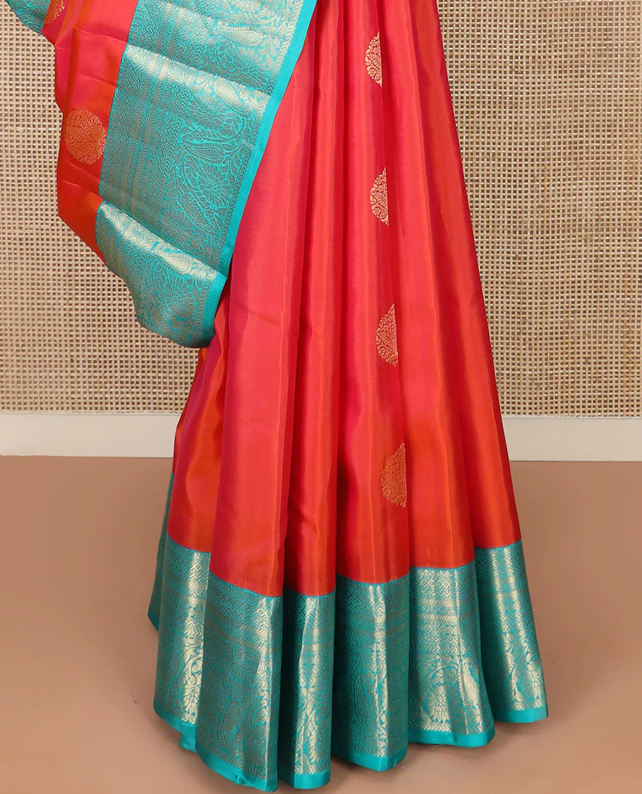 Orange Vasundhara Silk Saree Artfully Detailed with Zari Buttas, Complemented by a Contrast Border of Salngai, Neli, Kathir, and Floral-Paisley Designs, Zari-Rich Jaal Pallu, and Paired with a Contrast Zari-Bordered Blouse - Image 4