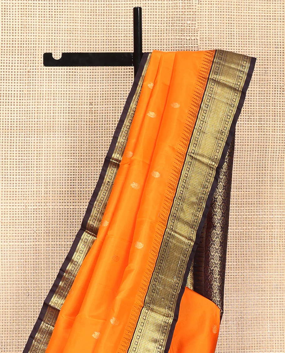 Orange Vasundhara Silk Saree, Artfully Woven with Mayil Buttas All Over Its Body, Complemented by Contrast Border Featuring Thazampoo Rekku, Muthu, Lavangam, and Mayil Kann Designs, a Grand Pallu of Jaal Designs, and Paired with a Contrast Blouse - Image 8