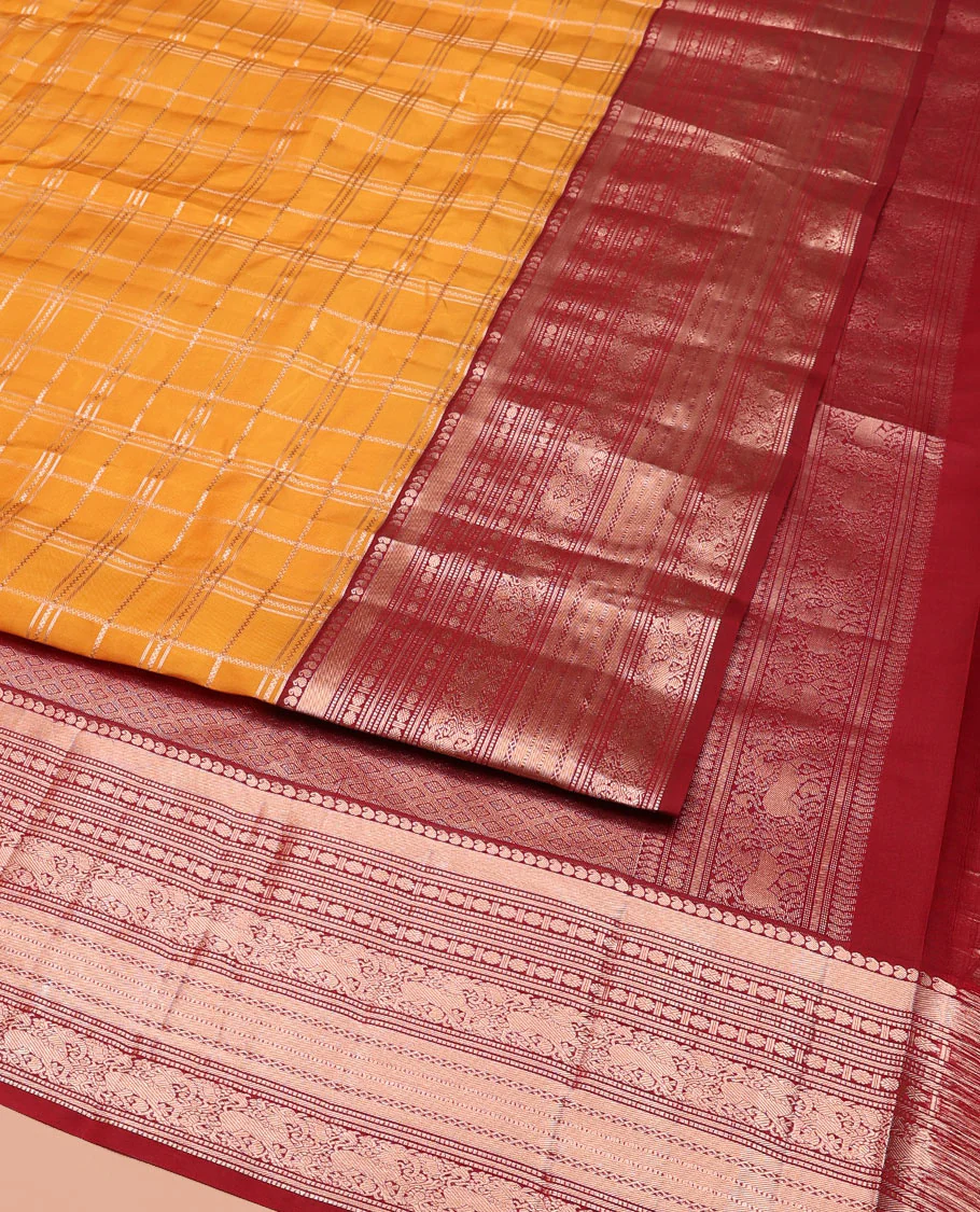 Orange Vasundhara Silk Saree Elevated with Zari Checks All Over Its Body, Complemented by a Contrast Border of Manga, Rudraksham, Yaali, Neli, and Muthu Designs, Zari Rich Jaal Pallu, and Paired with a Contrast Blouse - Image 3