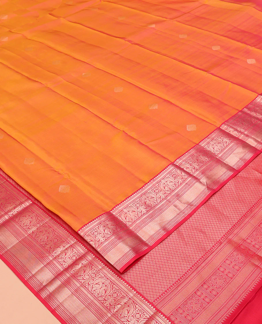 Orange Vasundhara Silk Saree, Sparsely Sparkled with Zari Buttas All Over Its Body, Complemented by a Contrast Border of Rekku, Muthu, Kili, Banaras, Neli, and Mayil Kann Designs, Grand Pallu, and Paired with a Contrast Blouse - Image 2